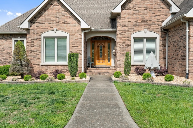 2039 Sparta Pike, Lebanon, TN 37090 - entrance to property featuring a shingled roof, brick siding, and a lawn