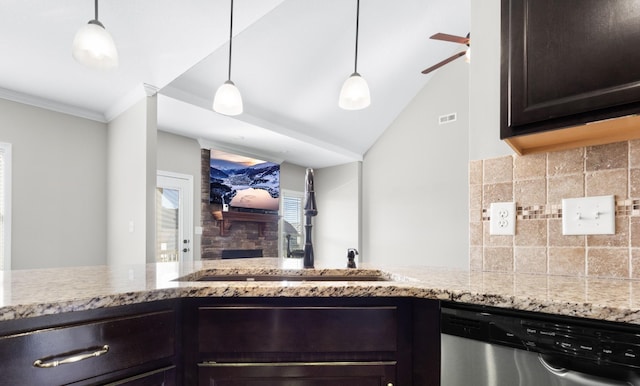 201 Josie Ln, Clarksville, TN 37043 - kitchen with dishwasher, a sink, light stone countertops, decorative backsplash, and dark brown cabinetry