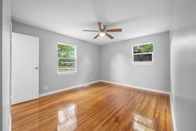 2705 Thrush Dr, Clarksville, TN 37040 - unfurnished room featuring hardwood / wood-style flooring, ceiling fan, and baseboards