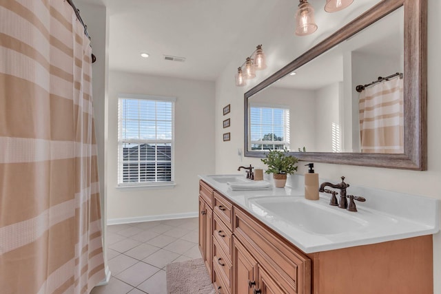 1032 Neeleys Bnd, Spring Hill, TN 37174 - bathroom with tile patterned floors, double vanity, and recessed lighting
