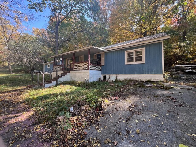 235 Ernest Looper Rd, Rickman, TN 38580 - view of front facade with a porch and metal roof