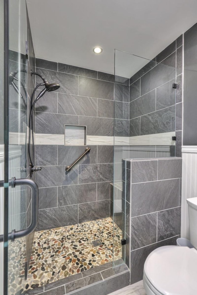 1880 E Compton Rd, Murfreesboro, TN 37130 - bathroom featuring toilet, a shower stall, recessed lighting, and tile walls