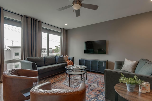 living area featuring ceiling fan, wood finished floors, and recessed lighting