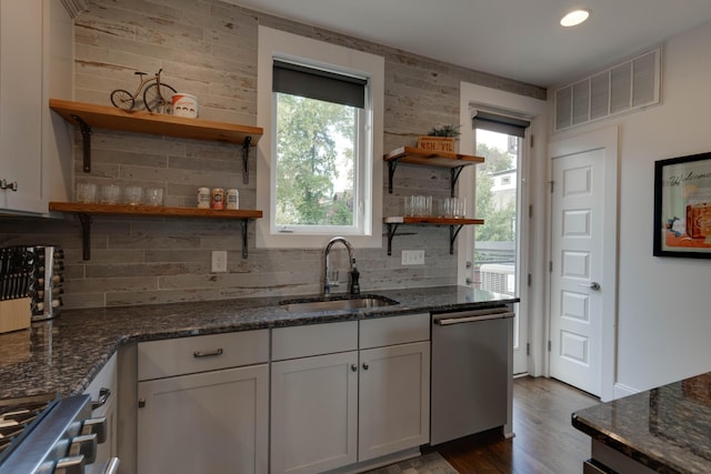 kitchen featuring open shelves, stainless steel dishwasher, tasteful backsplash, and recessed lighting