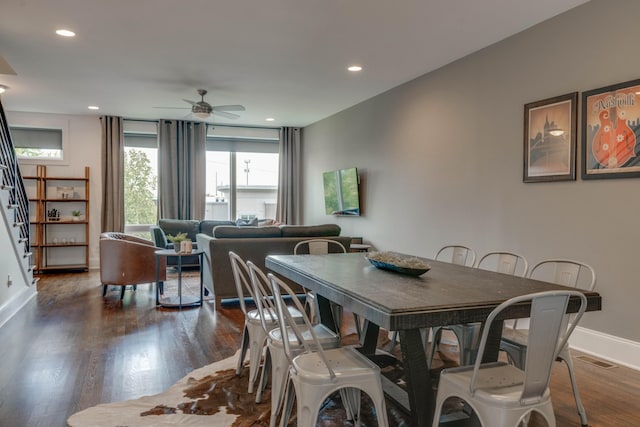 dining area with stairs, ceiling fan, dark wood-style flooring, baseboards, and recessed lighting