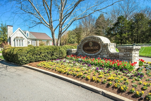 view of community sign