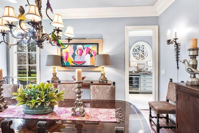 dining area featuring wine cooler and crown molding