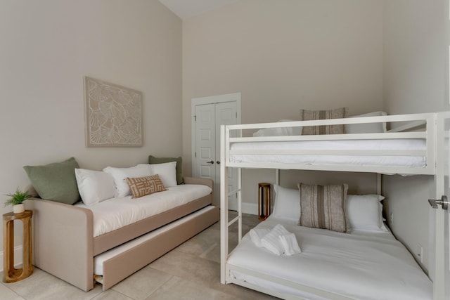 bedroom with tile patterned floors