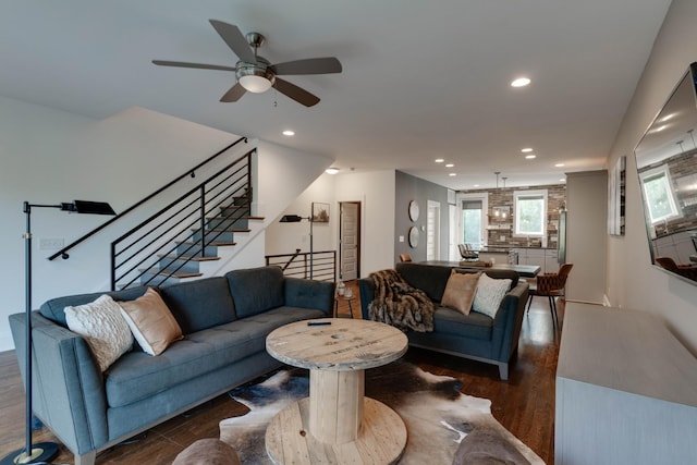 living room featuring dark wood-style flooring, recessed lighting, a ceiling fan, and stairway