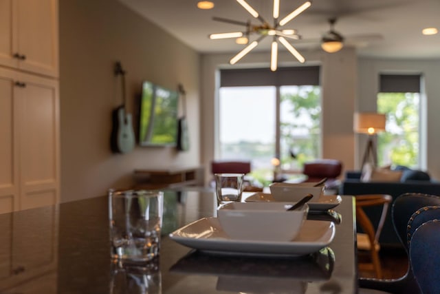 dining area with a chandelier and recessed lighting