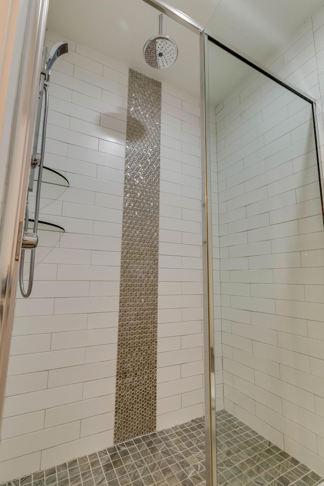 bathroom featuring a stall shower