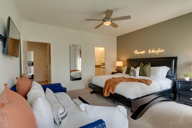 bedroom featuring carpet flooring, connected bathroom, a ceiling fan, and baseboards