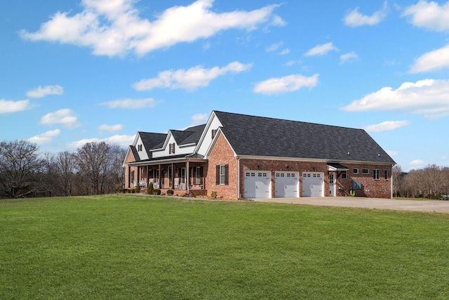 7480 Horn Tavern Rd, Fairview, TN 37062 - view of front of house with brick siding, a front yard, concrete driveway, and a porch