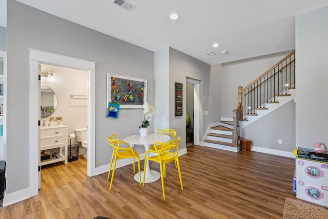 7480 Horn Tavern Rd, Fairview, TN 37062 - dining space featuring stairway, light wood-type flooring, baseboards, and recessed lighting