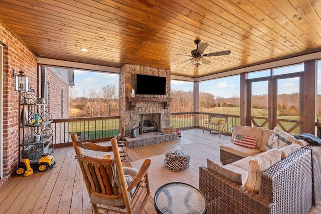 7480 Horn Tavern Rd, Fairview, TN 37062 - sunroom / solarium featuring an outdoor living space with a fireplace, ceiling fan, and plenty of natural light