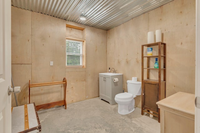 7480 Horn Tavern Rd, Fairview, TN 37062 - bathroom featuring unfinished concrete floors, toilet, and a sink