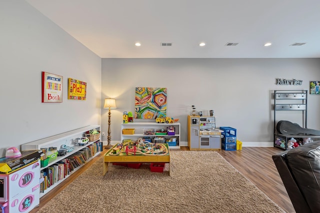 7480 Horn Tavern Rd, Fairview, TN 37062 - playroom featuring wood finished floors, recessed lighting, and baseboards