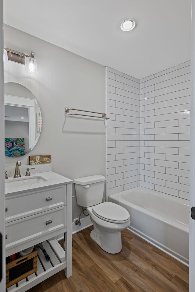 7480 Horn Tavern Rd, Fairview, TN 37062 - bathroom with toilet, wood finished floors, vanity, and tub / shower combination