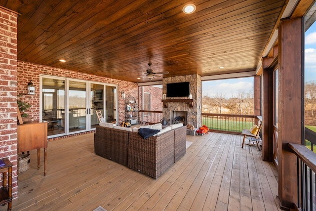 7480 Horn Tavern Rd, Fairview, TN 37062 - wooden deck with an outdoor living space with a fireplace and ceiling fan
