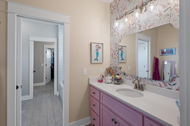 7480 Horn Tavern Rd, Fairview, TN 37062 - full bath with baseboards, vanity, and wood finished floors