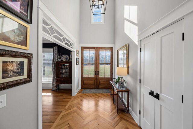 7480 Horn Tavern Rd, Fairview, TN 37062 - foyer entrance featuring a high ceiling, baseboards, and french doors