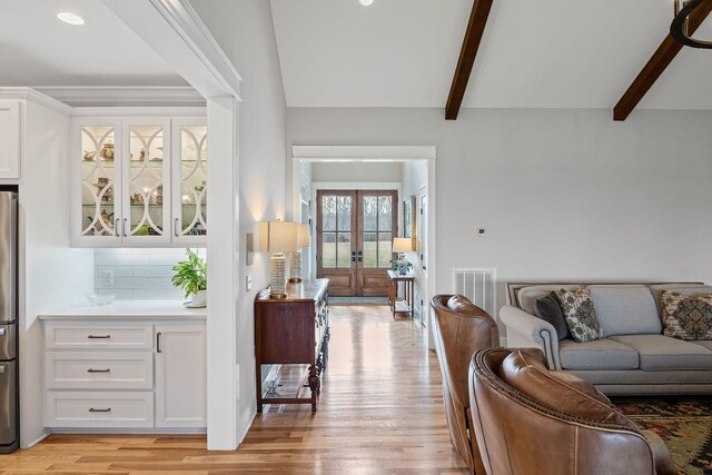 7480 Horn Tavern Rd, Fairview, TN 37062 - living area featuring beamed ceiling, light wood-style floors, french doors, and recessed lighting