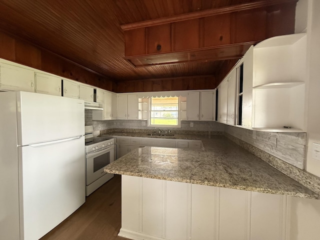 kitchen with white appliances, open shelves, wooden ceiling, under cabinet range hood, and a peninsula
