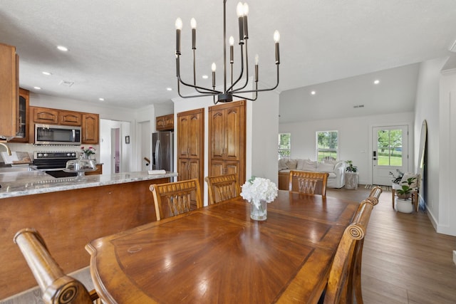 4588 Roy Thompson Rd, Mount Pleasant, TN 38474 - dining space with a chandelier, recessed lighting, and wood finished floors