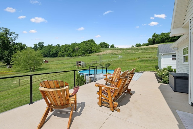 4588 Roy Thompson Rd, Mount Pleasant, TN 38474 - view of patio with a rural view and an outdoor pool