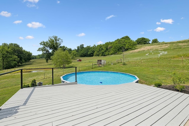 4588 Roy Thompson Rd, Mount Pleasant, TN 38474 - outdoor pool with a wooden deck, a yard, and a view of countryside