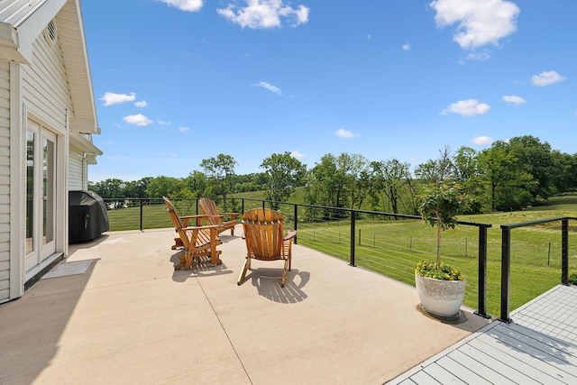 4588 Roy Thompson Rd, Mount Pleasant, TN 38474 - view of patio with a grill and view of scattered trees