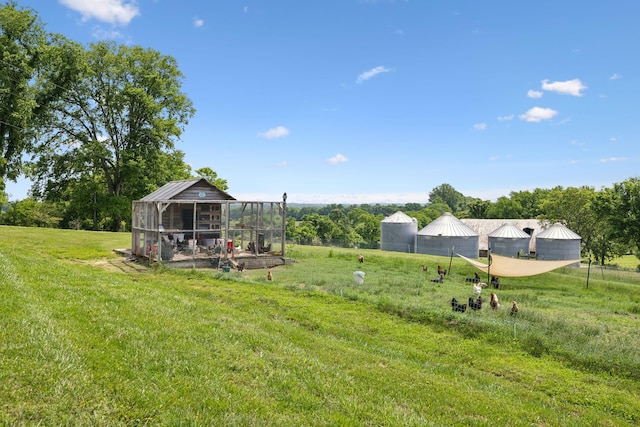 4588 Roy Thompson Rd, Mount Pleasant, TN 38474 - view of grassy yard with exterior structure and an outbuilding
