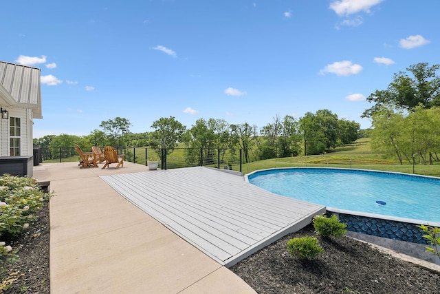 4588 Roy Thompson Rd, Mount Pleasant, TN 38474 - swimming pool featuring a wooden deck and view of scattered trees