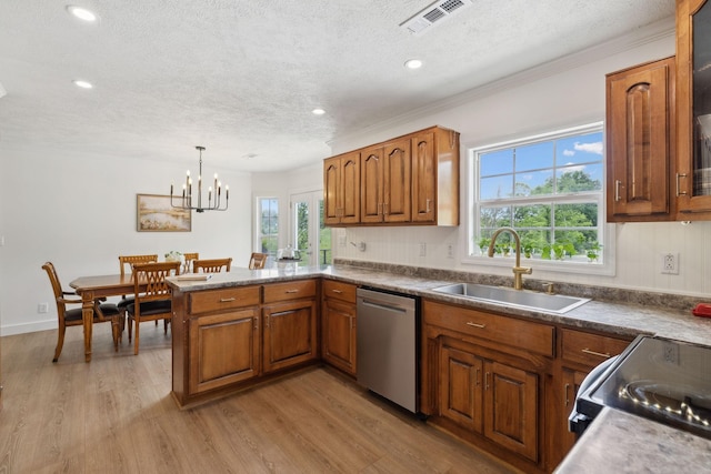 4588 Roy Thompson Rd, Mount Pleasant, TN 38474 - kitchen with a sink, dishwasher, a textured ceiling, brown cabinetry, and healthy amount of natural light