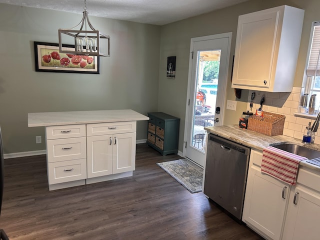 7324 Bermuda Dr, Christiana, TN 37037 - kitchen featuring stainless steel dishwasher, white cabinets, backsplash, light countertops, and dark wood-type flooring