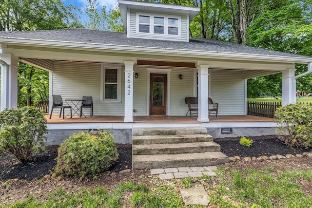2642 Stuart St, Burns, TN 37029 - view of front of property with covered porch and a shingled roof