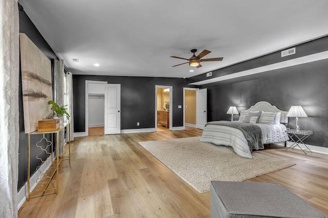 2642 Stuart St, Burns, TN 37029 - bedroom with baseboards, recessed lighting, light wood-type flooring, a spacious closet, and ceiling fan