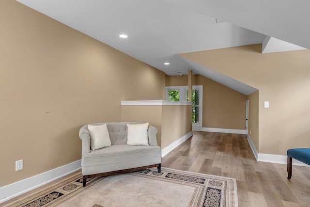 2642 Stuart St, Burns, TN 37029 - sitting room with wood finished floors, baseboards, recessed lighting, and lofted ceiling