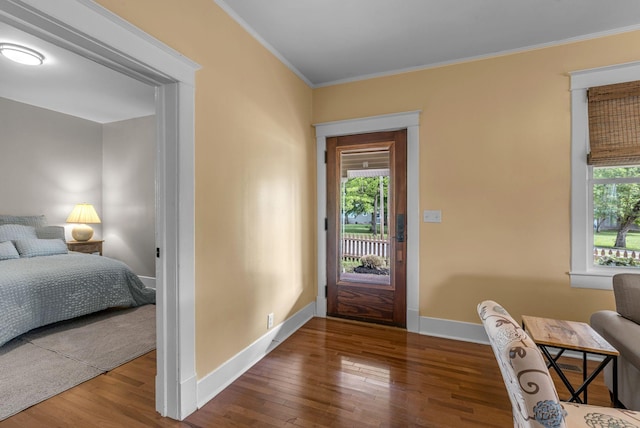 2642 Stuart St, Burns, TN 37029 - foyer entrance featuring wood finished floors, plenty of natural light, ornamental molding, and baseboards