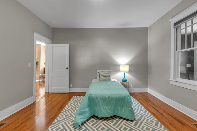 2642 Stuart St, Burns, TN 37029 - bedroom featuring wood finished floors and baseboards