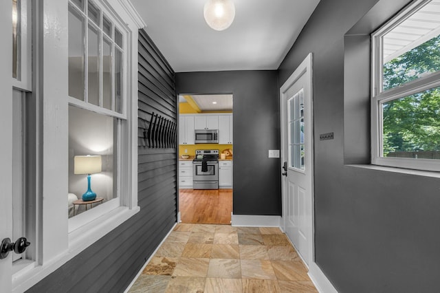 2642 Stuart St, Burns, TN 37029 - doorway featuring stone finish flooring and baseboards
