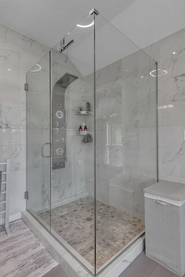1383 Carters Creek Pike, Columbia, TN 38401 - full bathroom with a marble finish shower, a textured ceiling, and vaulted ceiling