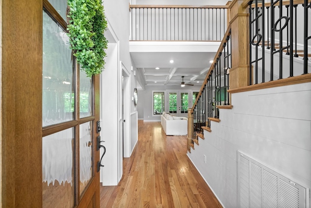 2477 Settlers Trce, Clarksville, TN 37043 - entryway with light wood-style floors, stairs, beamed ceiling, coffered ceiling, and a ceiling fan