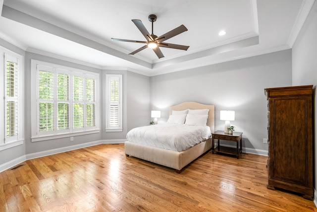 2477 Settlers Trce, Clarksville, TN 37043 - bedroom with a raised ceiling, crown molding, light wood-style flooring, ceiling fan, and recessed lighting