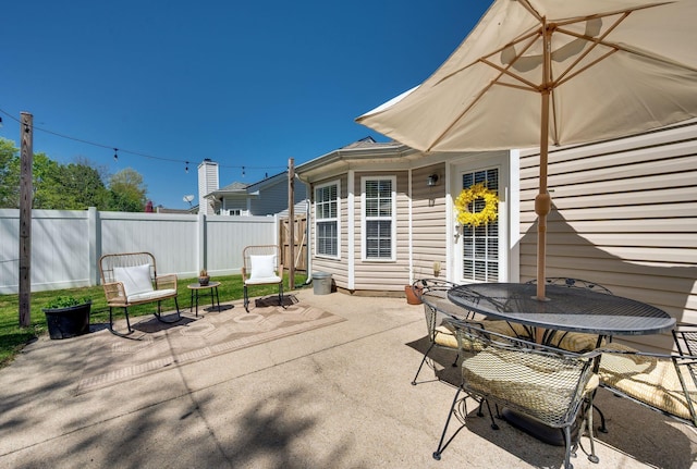 view of patio with fence