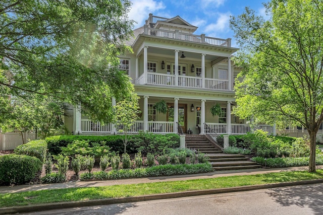 622 Stonewater Blvd, Franklin, TN 37064 - neoclassical / greek revival house featuring a balcony, covered porch, and stairs