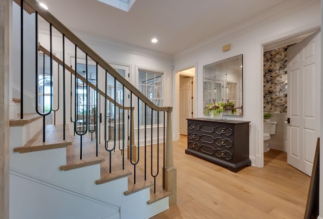 622 Stonewater Blvd, Franklin, TN 37064 - stairway featuring ornamental molding, wood finished floors, and recessed lighting