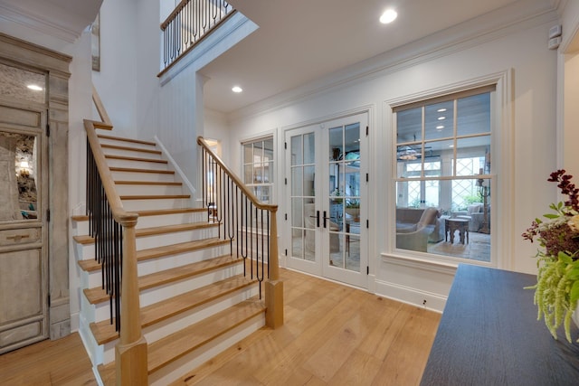 622 Stonewater Blvd, Franklin, TN 37064 - staircase featuring french doors, wood finished floors, ornamental molding, recessed lighting, and baseboards
