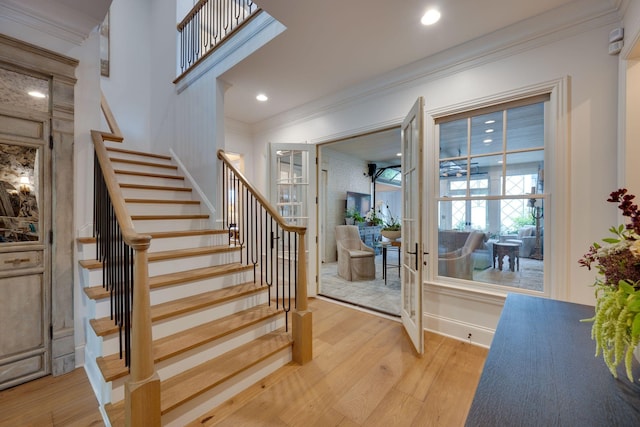 622 Stonewater Blvd, Franklin, TN 37064 - stairway with crown molding, wood finished floors, recessed lighting, and baseboards