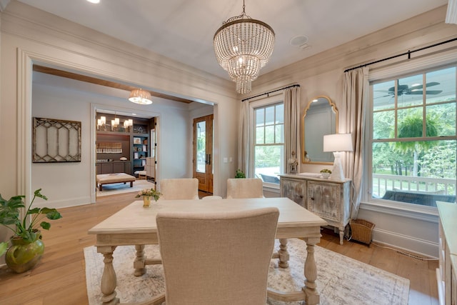 622 Stonewater Blvd, Franklin, TN 37064 - dining space with baseboards, light wood-type flooring, and a chandelier